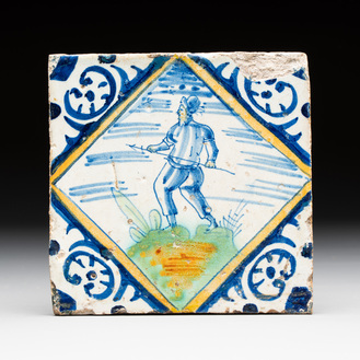 A polychrome Dutch Delft maiolica 'hunter with spear' diamond tile, ca. 1600