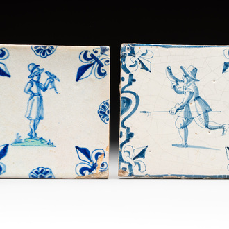 Two blue and white Dutch Delft 'horn blower' and 'falconer on green ground' tiles, 17th C.