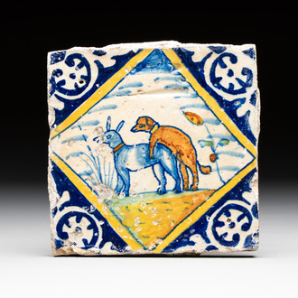 A polychrome Dutch Delft maiolica 'mating dogs' diamond tile, late 16th C.