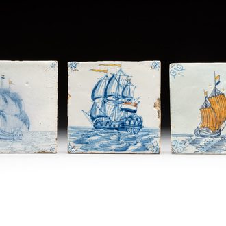 Three blue and white Dutch Delft 'ships with coloured flags' tiles, 17th C. and later