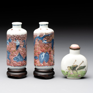 A pair of Chinese blue, white and copper-red 'mythical beasts' and a famille rose 'grasshopper' snuff bottle, Yongzheng and Daoguang mark, 19th C.