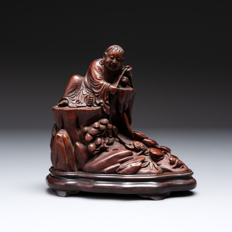 A fine Chinese carved bamboo group with Liuhai on wooden stand, 19th C.