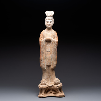A large Chinese painted pottery figure of a civil official, Tang