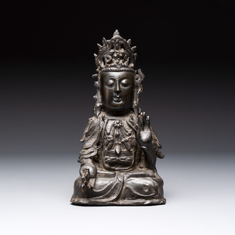 A Chinese bronze seated Guanyin, Ming