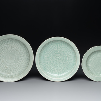Three Chinese celadon-glazed plates with floral anhua design, 18/19th C.
