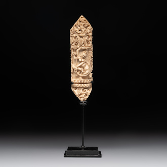 A Tibetan carved bone apron ornament with a dakini, 19th C.