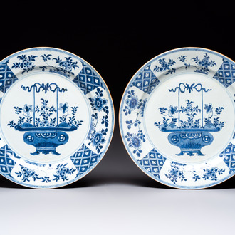 A pair of Chinese blue and white 'flower basket' dishes, Yongzheng