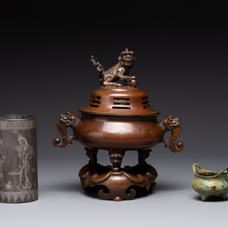 A Chinese bronze tripod censer with cover and stand, a small tripod censer and a silver-inlaid iron brush pot, 19/20th C.