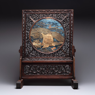 A Chinese wooden table screen with an embroidered silk with turtle design, 19th C.