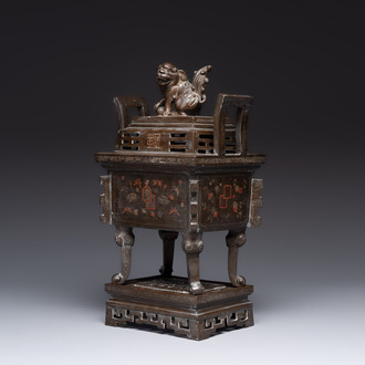 A large Vietnamese copper- and silver-inlaid rectangular 'Buddhist lion' censer and cover on stand, 19th C.