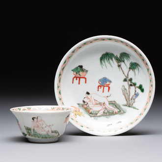 A Chinese famille verte 'erotic' cup and saucer, lingzhi mark, Kangxi
