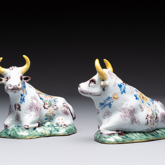 A pair of polychrome Dutch Delft reclining cows, 18th C.