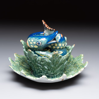 A rare polychrome Dutch Delft pike tureen and cover on stand, 18th C.