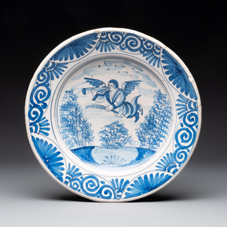 A blue and white Dutch maiolica 'putto with trumpet' dish, 2nd half 17th C.
