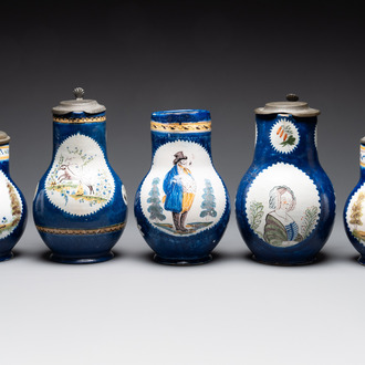 A collection of five polychrome Brussels faience jugs, some with pewter-mounts, 18/19th C.