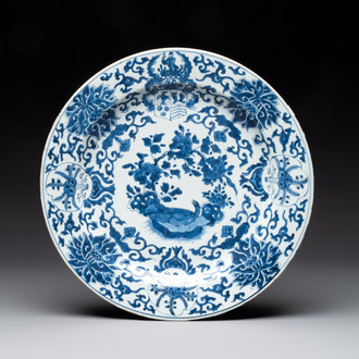 A Chinese blue and white armorial dish with the arms of Pelgrom for the Dutch market, Kangxi