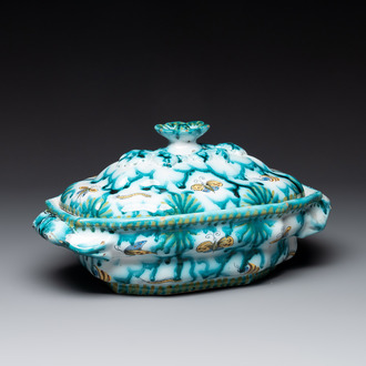 A Brussels faience tureen and cover with butterflies and caterpillars, 18th C.