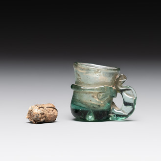 A Dutch or German green glass reliquary holder, excavated in Maastricht, 16/17th C.