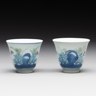 A pair of Chinese doucai 'narcissus' wine cups, Guangxu mark and of the period
