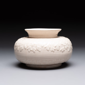 A rare Chinese Dehua blanc de Chine vase with floral design, Kangxi