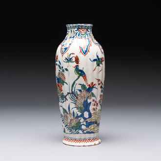 A fine polychrome Dutch Delft cashmere palette ribbed vase with birds among flowering branches, early 18th C.
