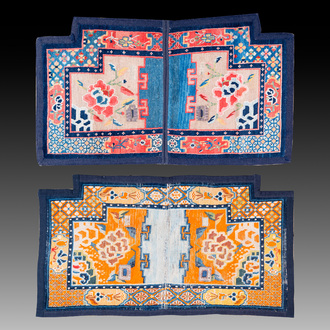 Two Tibetan saddle rugs with floral design, 19th C.