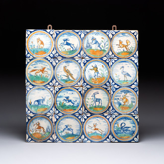 A field of 16 polychrome Dutch Delft medallion tiles with animals and a pikeman, 17th C.