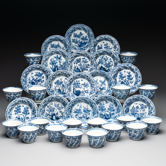 18 Chinese blue and white cups and 16 saucers with floral design, jade mark, Kangxi