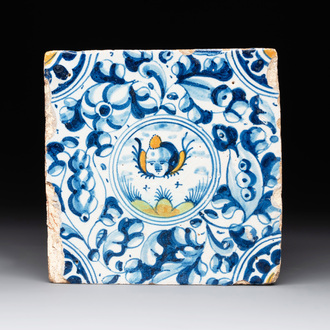 A fine polychrome Dutch Delft maiolica tile with a cherub, ca. 1600