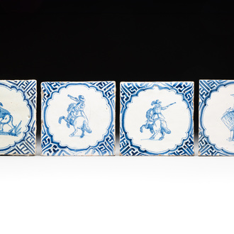 Four blue and white Dutch Delft 'horserider', 'drummer' and 'dog' tiles, 17th C.