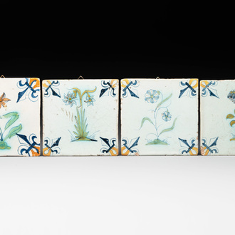 Four polychrome Dutch Delft 'flower' tiles, 17th C.