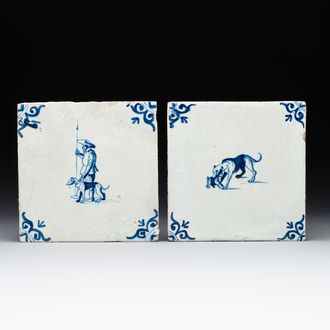 Two blue and white Dutch Delft 'shepherd and dog' and 'dog with puppy' tiles, 17th C.