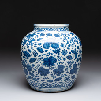 A large Chinese blue and white jar with Buddhist symbols and foliage, Jiajing/Wanli period