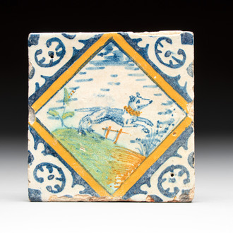 A small polychrome Dutch Delft maiolica 'dog' diamond tile, late 16th C.