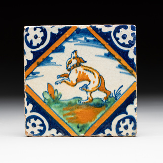 A polychrome Dutch Delft maiolica 'dog' diamond tile, late 16th C.