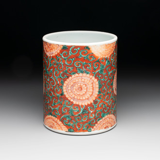 A Chinese famille verte coral-red-ground 'chrysanthemum scroll' brush pot, Kangxi