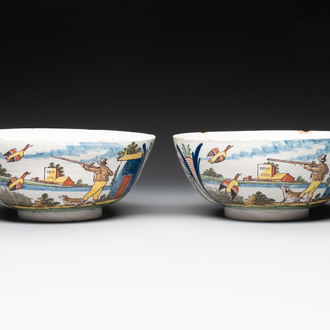 A pair of polychrome Dutch Delft 'duck hunt' bowls, 18th C.