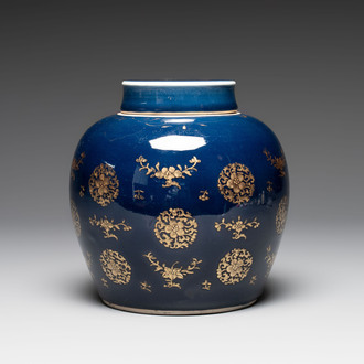 A Chinese gilt-decorated blue-ground jar and cover with floral design, Qianlong