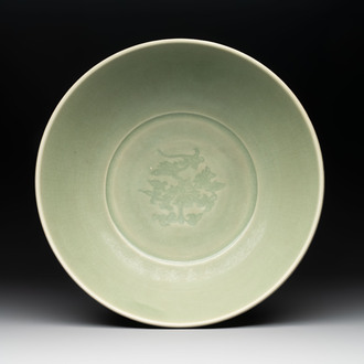 A Chinese Longquan celadon bowl with 'anhua' floral design, Ming