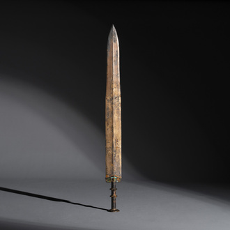 A rare Chinese turquoise-inlaid parcel-gilt bronze sword, Zhou
