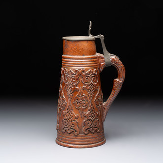 A Beauvais stoneware tankard, France, 19th C.