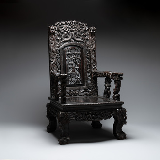 A richly carved Chinese lacquered hongmu armchair, Canton, 19th C.