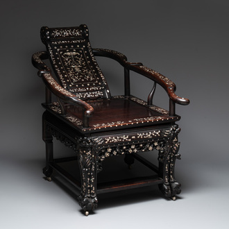 A Chinese mother-of-pearl-inlaid hongmu reclining armchair with a retractable footrest, Canton, 19th C.