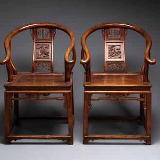 A pair of Chinese wooden 'horseshoe' chairs, 19/20th C.