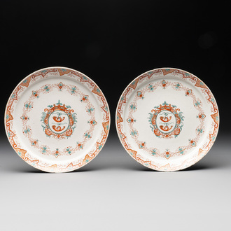 A pair of polychrome Dutch Delft doré armorial plates, dated 1728
