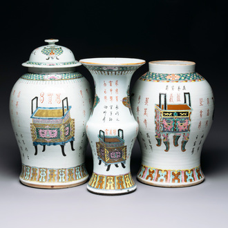 Three Chinese famille rose vases, one with cover, signed Wu Yu 吴玉, dated 1912