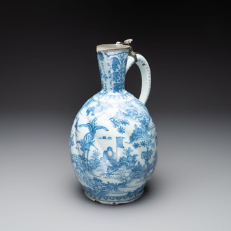 A large blue and white Dutch Delft chinoiserie jug with a mounted pewter lid, 17th C.