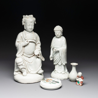 Two Chinese Dehua blanc de Chine Buddha and Wenchang figures, a seal paste covered box, a vase and an iron-red-glazed boy, Qianlong mark, 19/20th C.