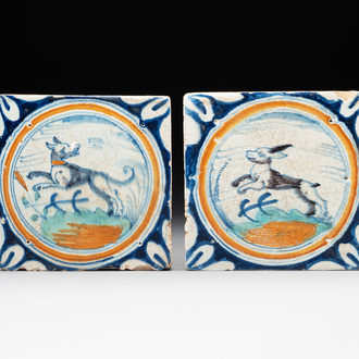 Two polychrome Dutch Delft maiolica 'dog' and 'hare' medallion tiles, late 16th C.