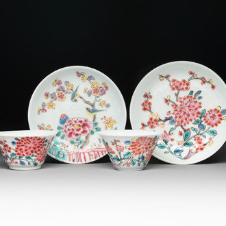Two Chinese famille rose 'birds on flowering branches' cups and saucers, Yongzheng